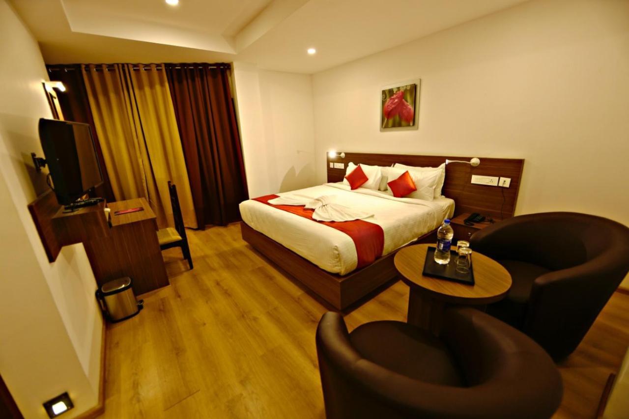Hotel Nithya Kottayam Buitenkant foto